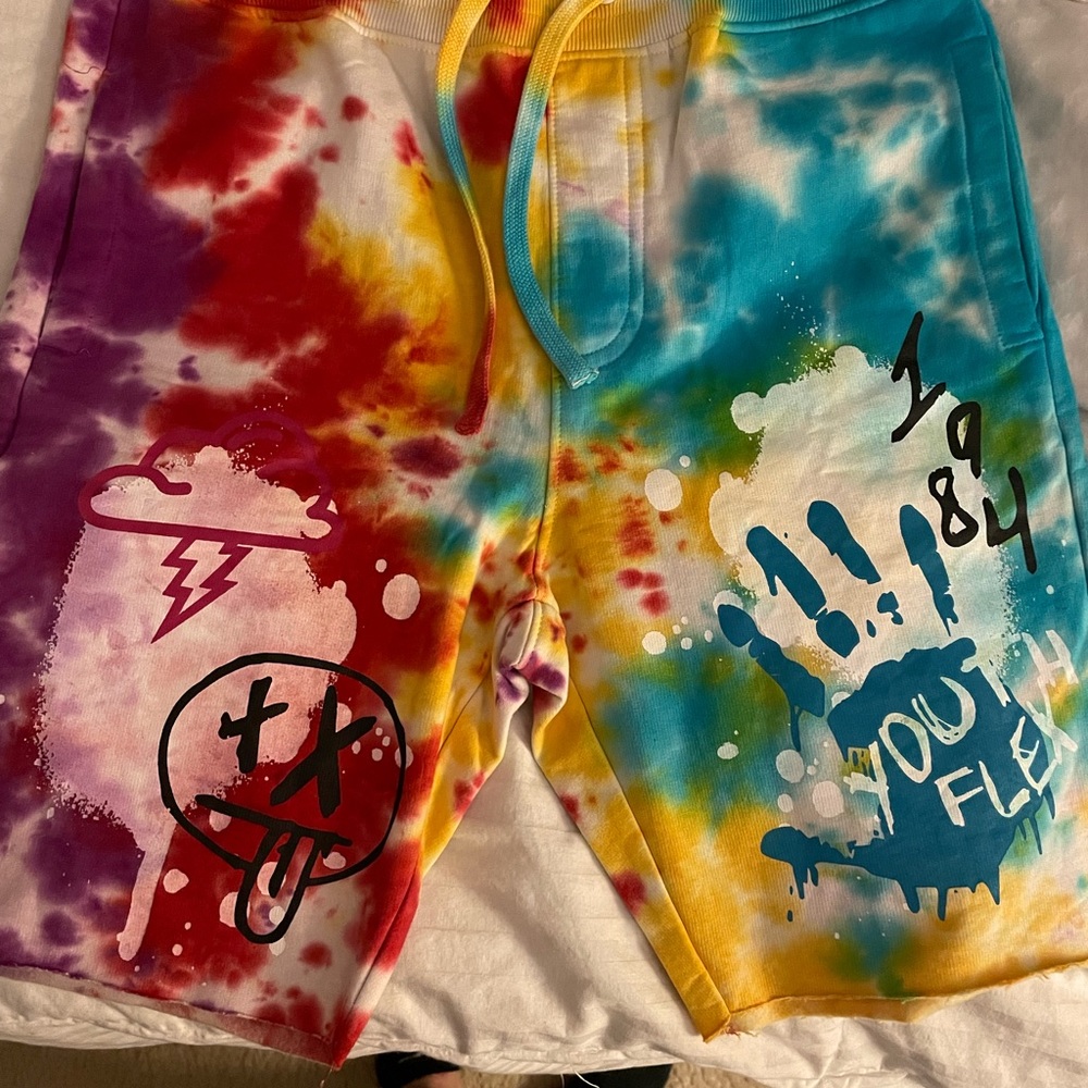 Mens size medium tie-dye shorts. No tags but never worn.